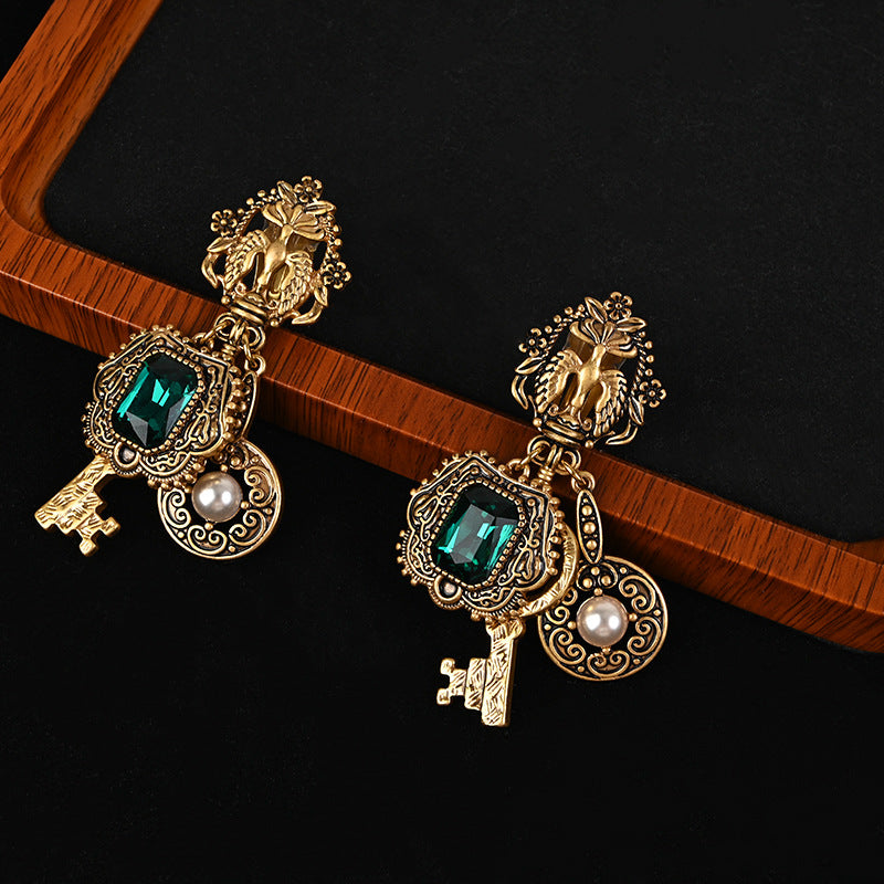 French retro key green glass ear clip earrings