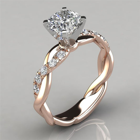 Zilora – Prinzessinnenring mit Twist ✨ 18K Roségold plattiert – Funkelnder Luxus in zwei Farben